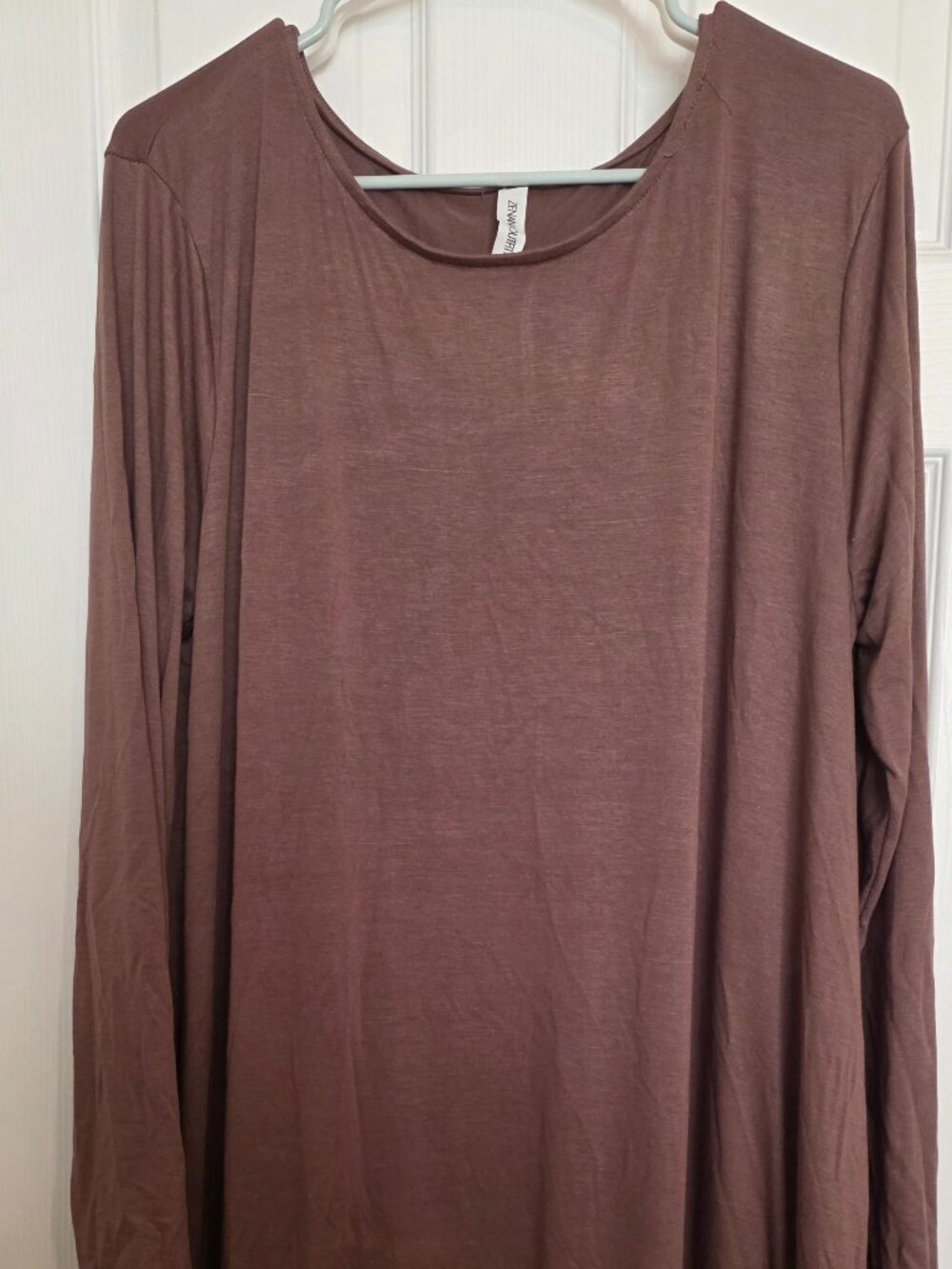 Long sleeve brown dress with ruffled bottom